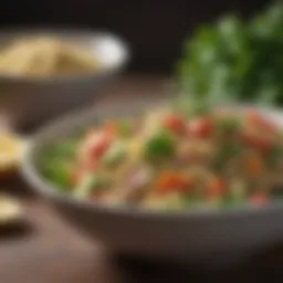 A vibrant bowl of quinoa salad with fresh vegetables and herbs