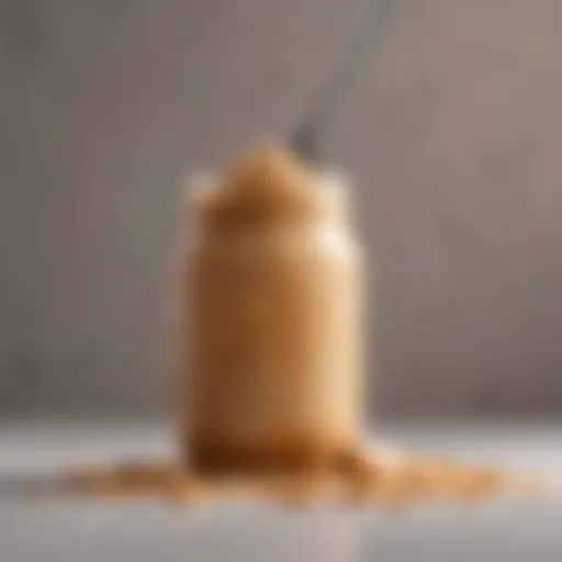 A jar of creamy peanut butter with a spoon