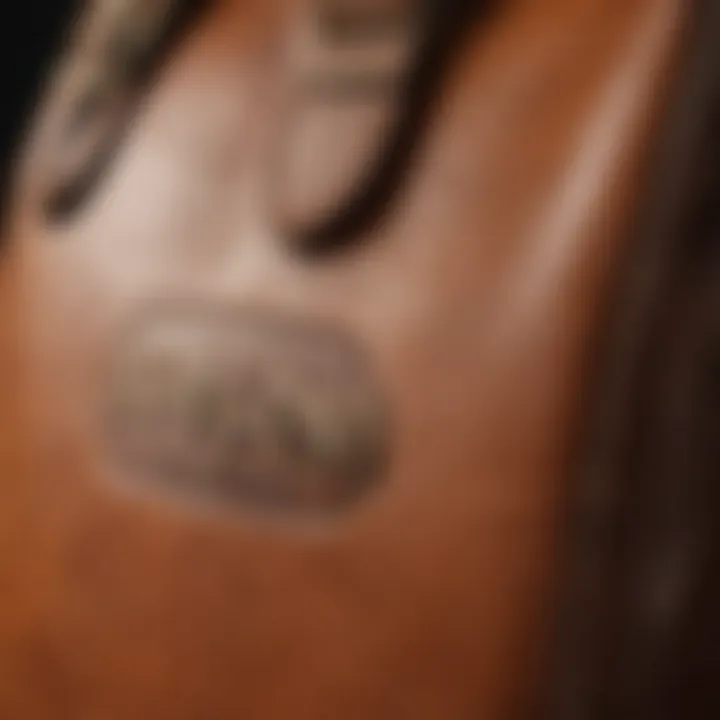 Close-up of the stitching and texture of a brown leather punch bag