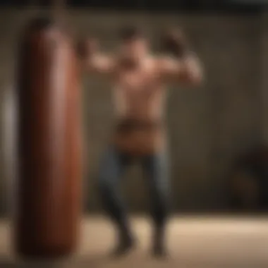 Person striking the brown leather punch bag during a training session