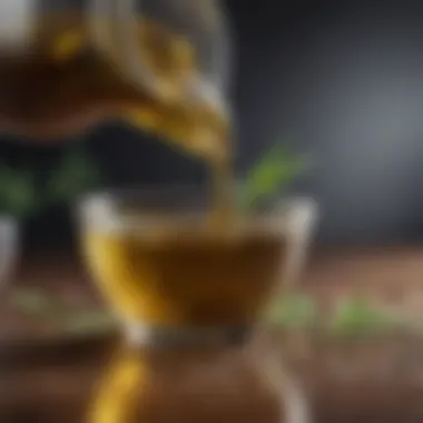 Hemp Seed Oil Hemp seed oil being poured into a glass container
