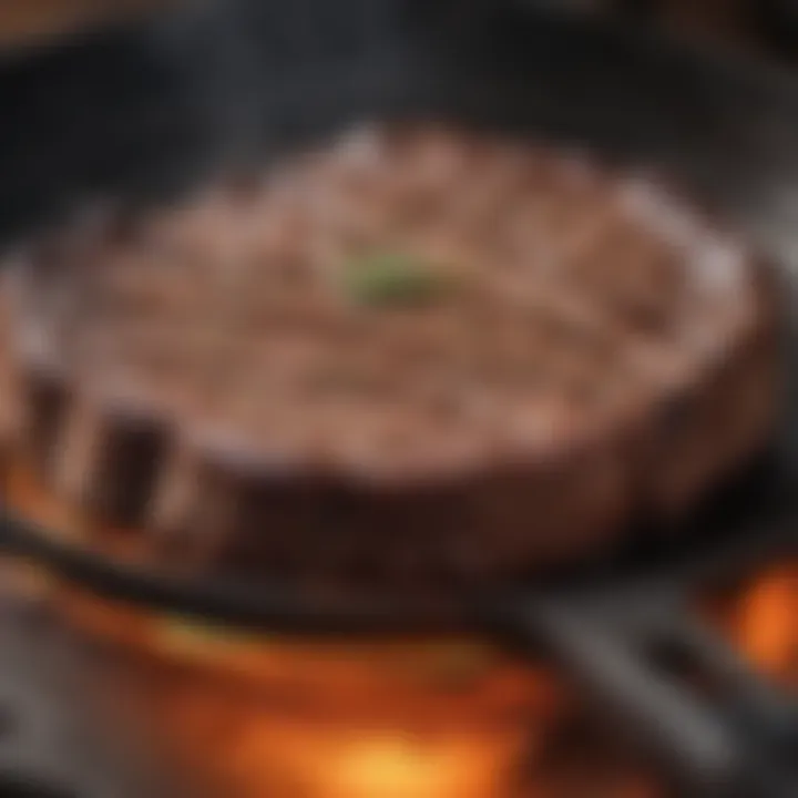 Close-up of steak on a sizzling skillet