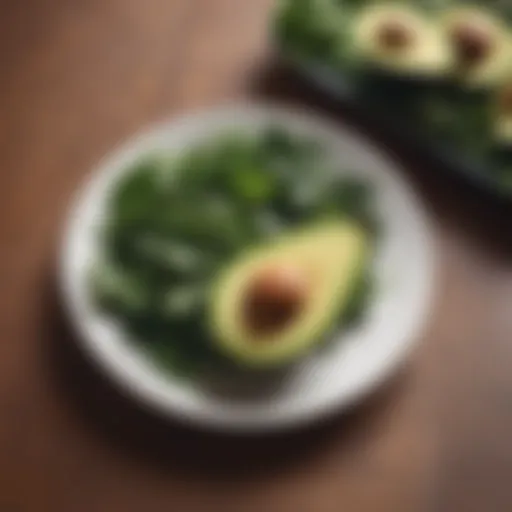 Fresh avocado and leafy greens on a plate