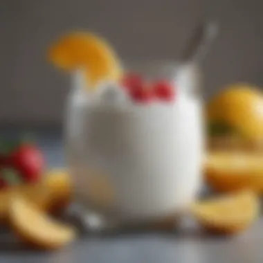 A close-up of yogurt in a glass jar with a spoon and fruit slices