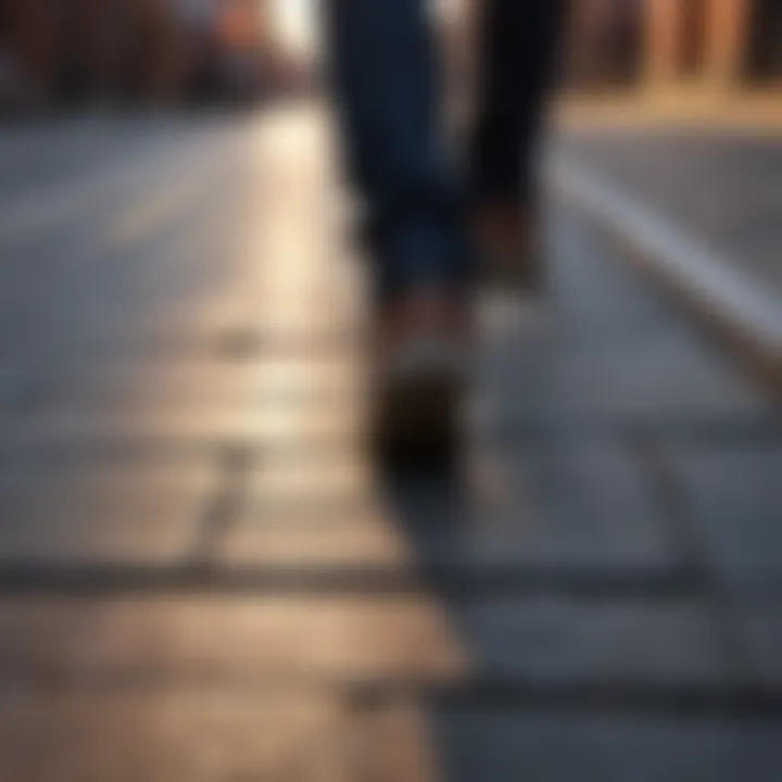 Close-up of feet in motion on a pavement